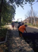 Асфальтують дорогу по вулиці Матросова 